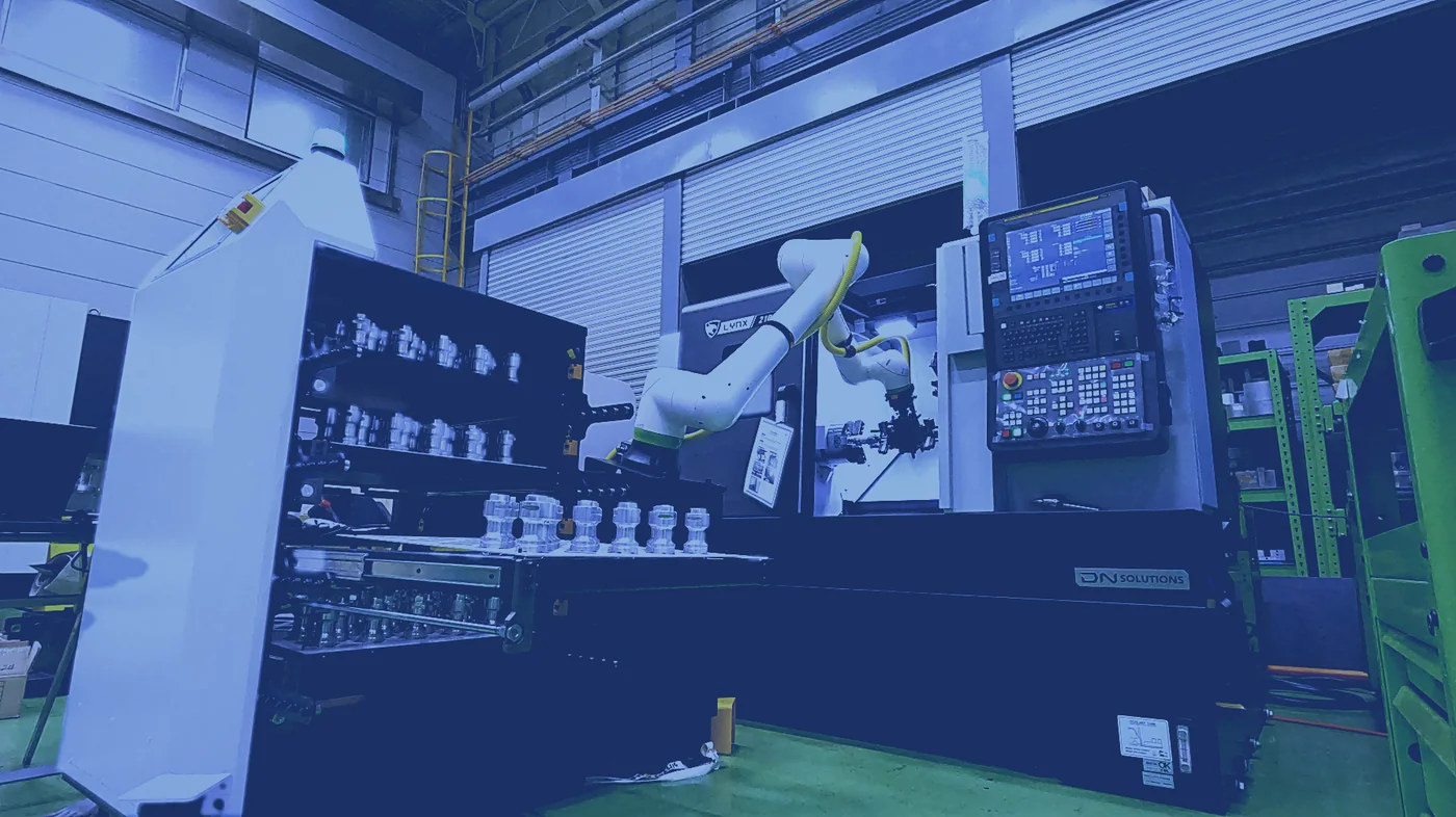 Labot SD robotic machine tending system loading a CNC machine